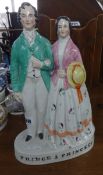 A 19th century Staffordshire group 'Prince and Princess', height 29cms.