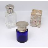 Three Victorian scent bottles, including blue glass & silver mounted and a mother of pearl cased