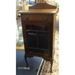 A mahogany side cabinet fitted with a drawer on cabriole legs, width 56cm.