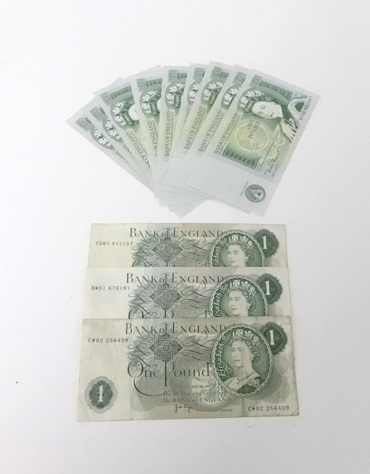 Thirteen English £1 notes.