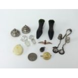 Collection of various small objects including two carved wood pin cushion boots, miniature