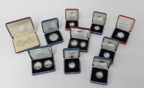 A Royal Mint collection of silver proof £1 and £2 coin sets all cased including 1990 5p two coin