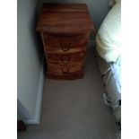 Narrow pine chest of 6 drawers and a modern three drawer bedside chest (2)..