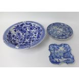 A 19th century blue and white dish decorated in a landscape, a blue and white comport decorated with