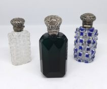 Three Victorian scent bottles including green glass, continental and clear glass and overlay blue (