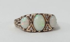 A 9ct opal and diamond ring, size M.