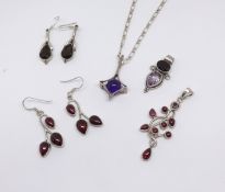 A collection of modern stylish silver and coloured stone jewellery including pendant necklace,