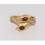 An 18ct yellow gold ruby and diamond snake, size P, approx 6.5ogms.