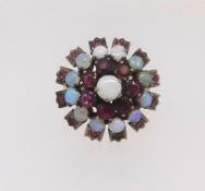 An antique high set ruby and opal cluster ring, size S.
