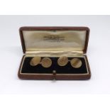 A pair of 9ct gold gents cufflinks, cased, approx 9.7gms.