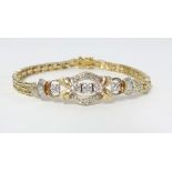 An 18ct diamond set bracelet, length 18cm.