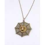 A 14ct spiders web pendant and chain, 5.70gms.