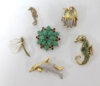 A collection of six brooches including a 9ct gold seahorse.