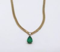 An 18ct emerald and diamond pendant necklace, approx 11.60gms.