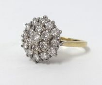 An 18ct cluster ring, size O.