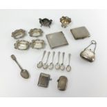 A collection of silverwares, including vestas, cigarette cases, spoons, table salts etc, approx