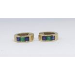 A pair of 18ct gold and sapphire and emerald set earrings, 6.6gms.