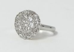 A platinum diamond cluster ring, size N.