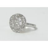 A platinum diamond cluster ring, size N.