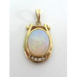 A 14ct opal and diamond set pendant.