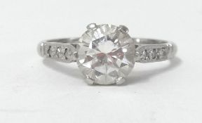 A platinum and diamond set ring, the centre stone approx 1.50ct, size N.