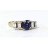 A sapphire and diamond five stone ring set with baguette cut diamonds, size M.