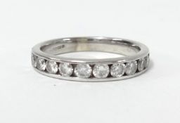 A 9ct diamond and half band eternity ring with ten round brilliant cut diamonds, weight approx 0.