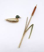 A modern 18ct gold and enamel duck brooch and a 18ct water reed brooch, approx 12.30gms (2).