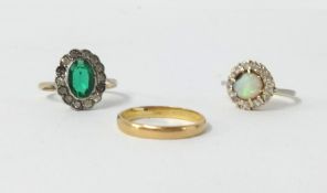 A 22ct gold wedding band, 2gms, an opal and diamond cluster ring set in yellow gold and a 9ct