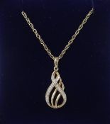 A 9ct and diamond set pendant necklace.