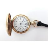 Elgin, a 9ct gold 'American Waltham' ladies pocket watch with ornate design of birds on case, the