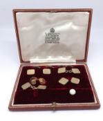 Garrard & Co, a 9ct gold gents shirt set in original case, approx 12gms.