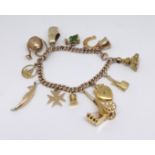 A mixed 9ct and 14ct gold charm bracelet, approx 49.30gms.