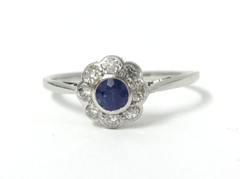 An 18ct white gold diamond and sapphire cluster ring, size O. - Image 2 of 3