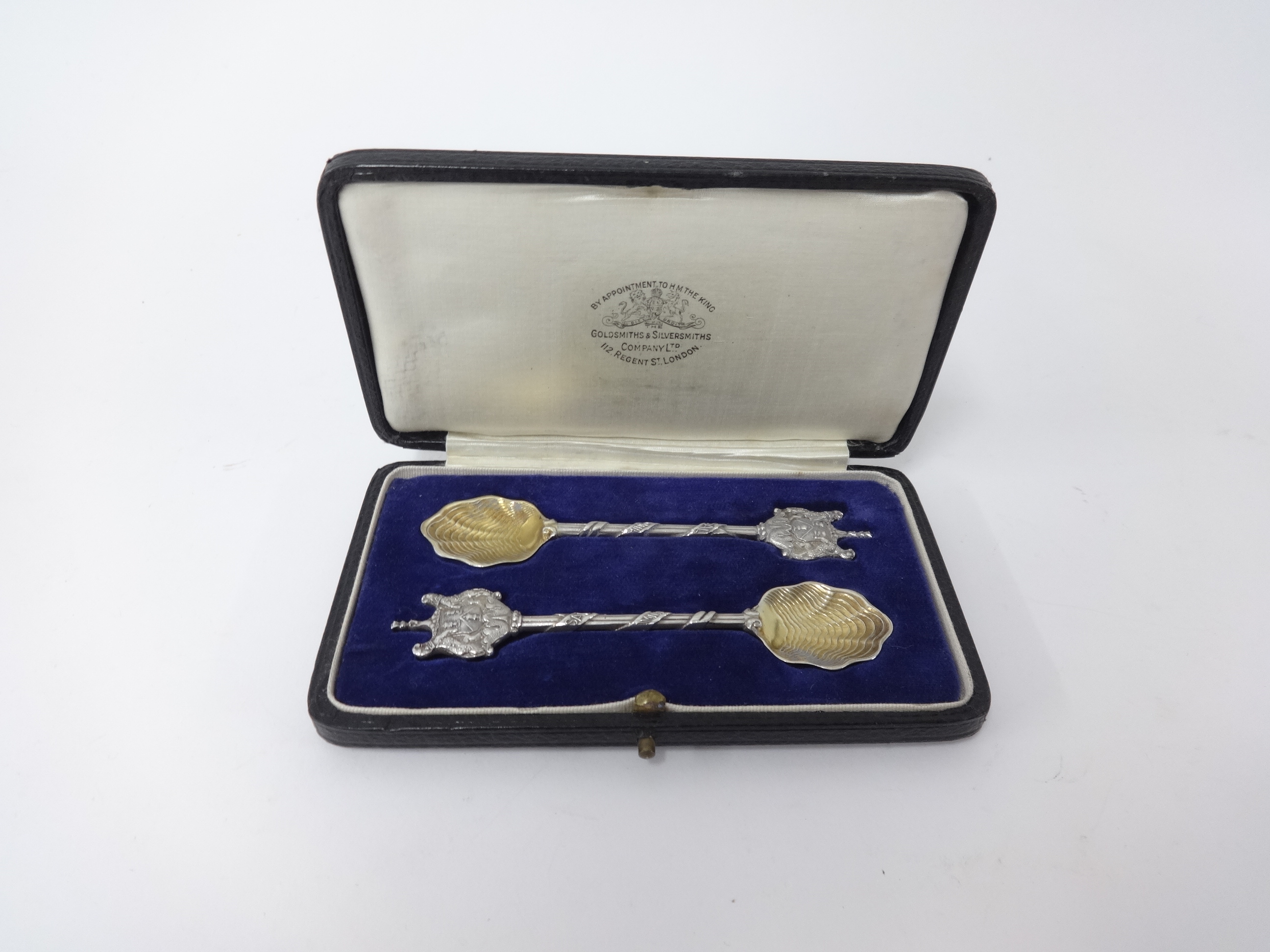 Salters Company, a pair of silver and gilt presentation spoons with certificate, cased.