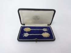 Salters Company, a pair of silver and gilt presentation spoons with certificate, cased.