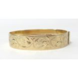 A 9ct gold bangle, approx 25.50gms.