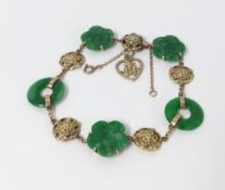 A jade and yellow gold bracelet.