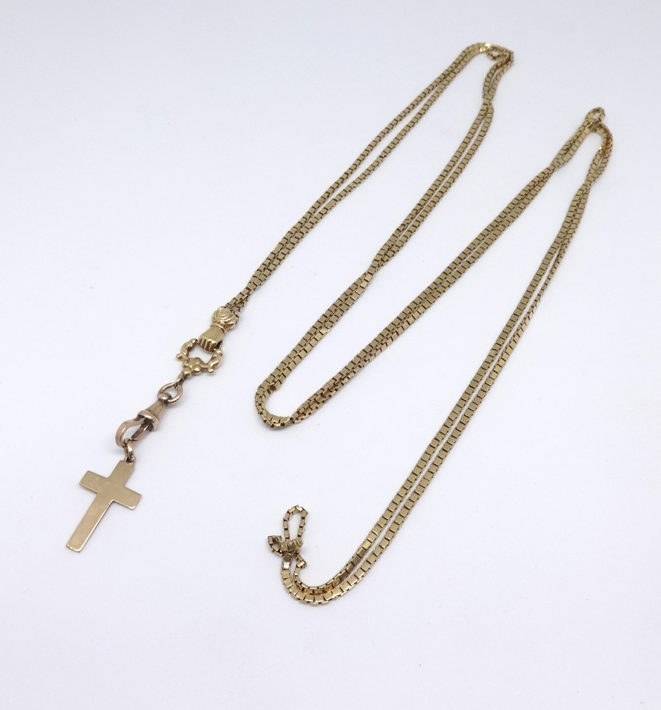 A 9ct gold chain and cross, approx 28.80gms.