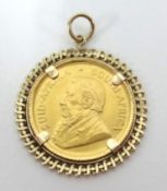 A gold 1980 1/10oz krugerrand coin mounted, approx 4.30gms.