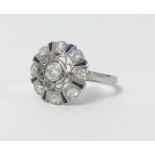 A diamond and sapphire cluster ring set in white gold?, size N.