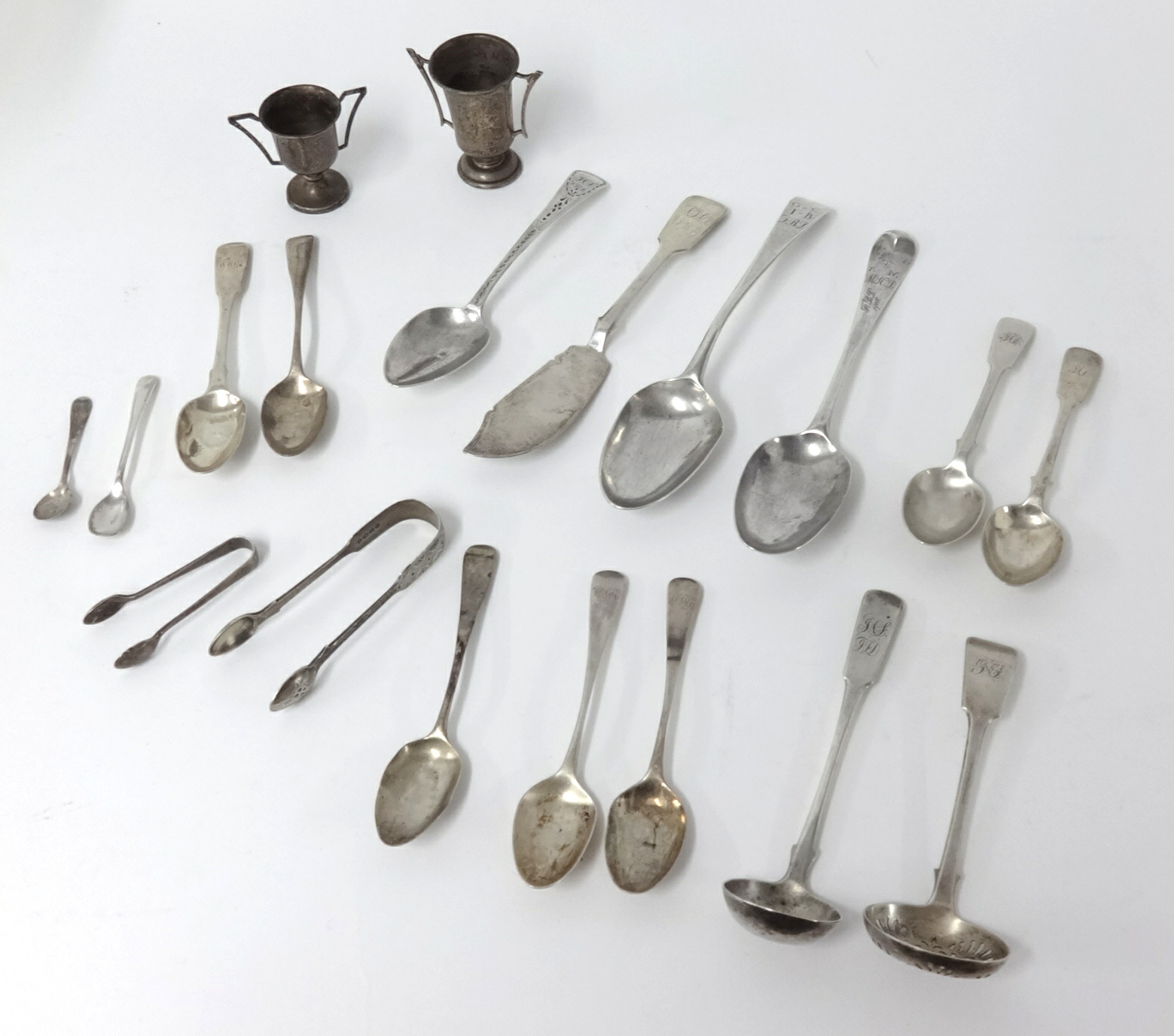 A collection of Georgian and later silver spoons, including with inscription 'Poetry Rewarded by Sir