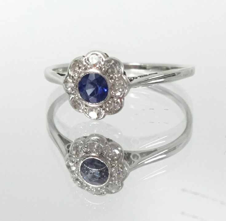 An 18ct white gold diamond and sapphire cluster ring, size O. - Image 3 of 3