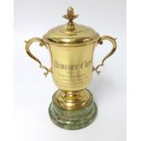The Bibury Cup, silver and gilt cup, inscribed 'Bibury Cup, won by Nous Esperons, Salisbury, 29th