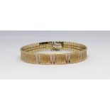 A 18ct Saudi Arabia gold multi coloured and textured bracelet, marked '750', approx 24gms.