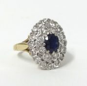 An 18ct sapphire and diamond cluster ring, size L.