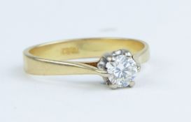 An 18ct diamond single stone engagement ring, approx 0.30/0.40cts, size L.