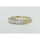 An 18ct princess cut diamond five stone engagement ring, size N.