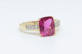 A 14k rubellite/tourmaline set ring, size P.