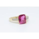 A 14k rubellite/tourmaline set ring, size P.